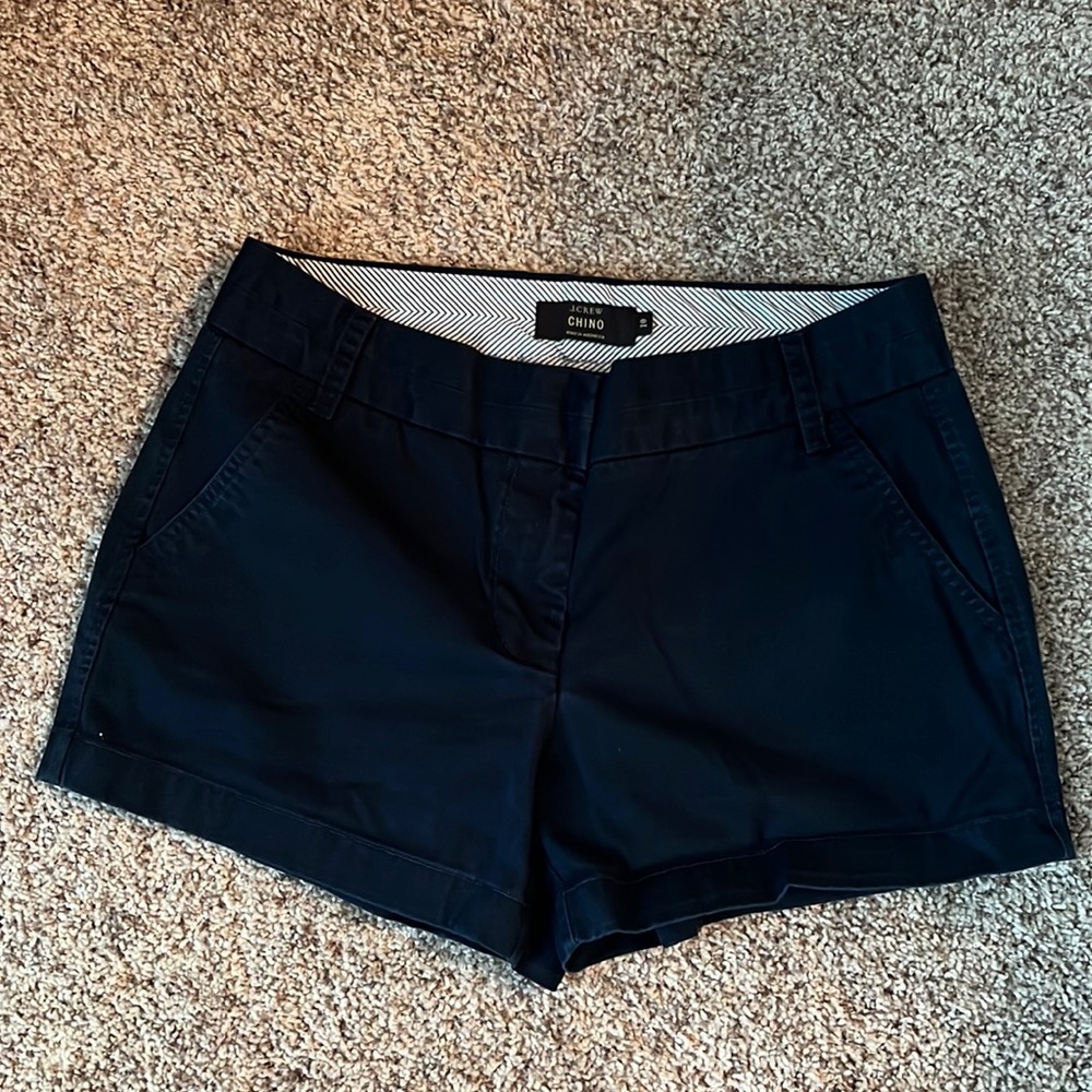 J Crew 4” chino shorts. Navy color, mid rise. Excellent condition.